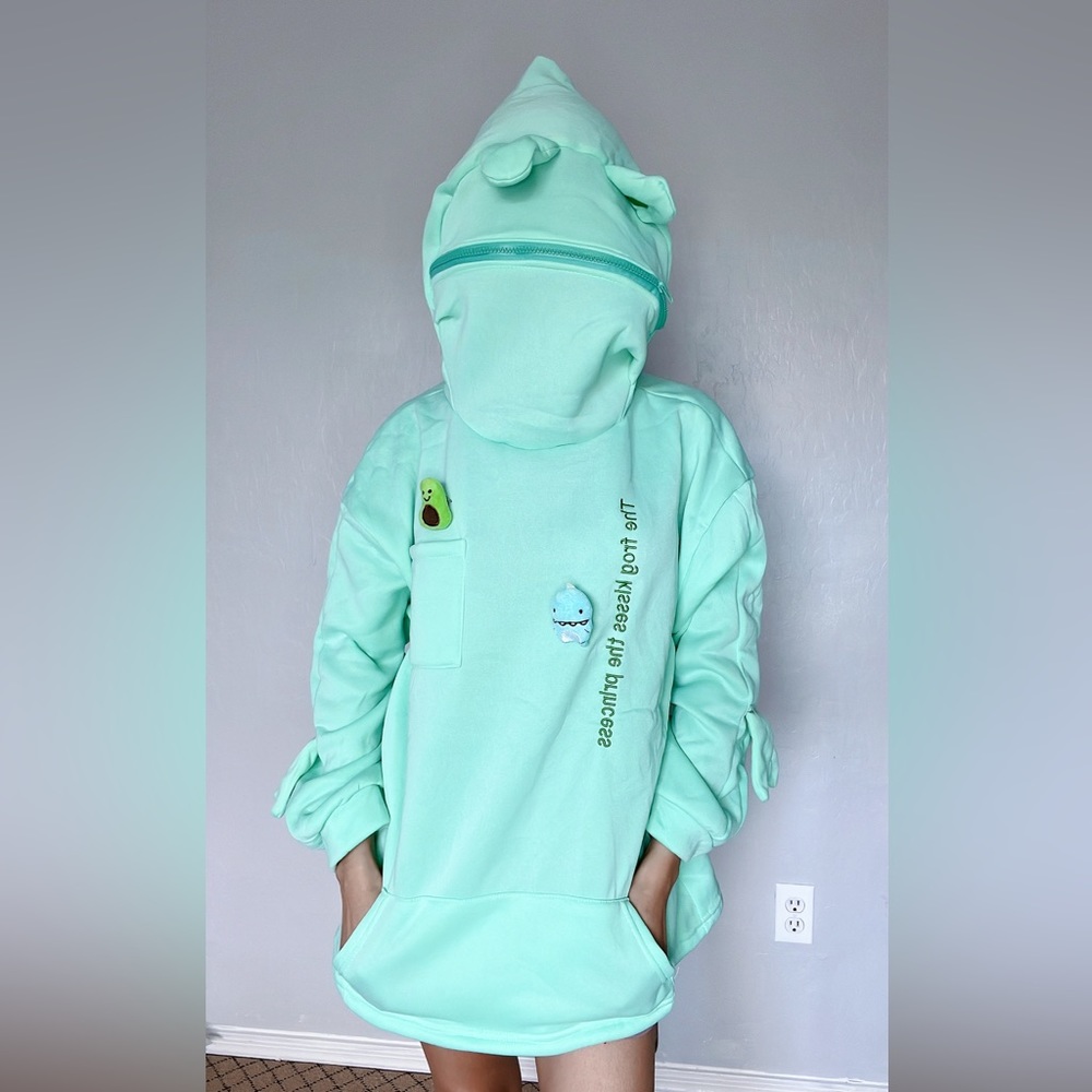 BRAND NEW cool green sweater